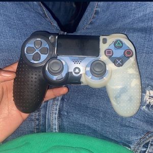 PLAYSTATION FULLY WORKING CONTROLLER WTH GRIP  BAND AROUND IT